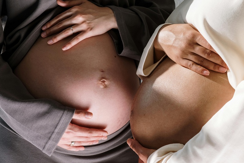 a close up of a pregnant woman's belly