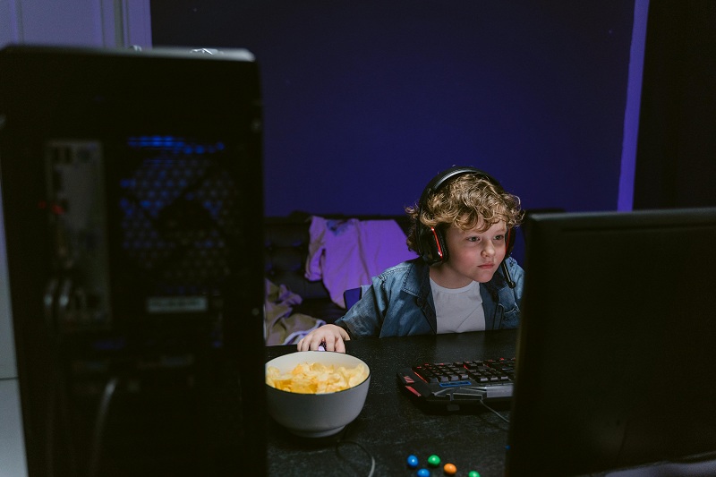 kid busy in playing online games