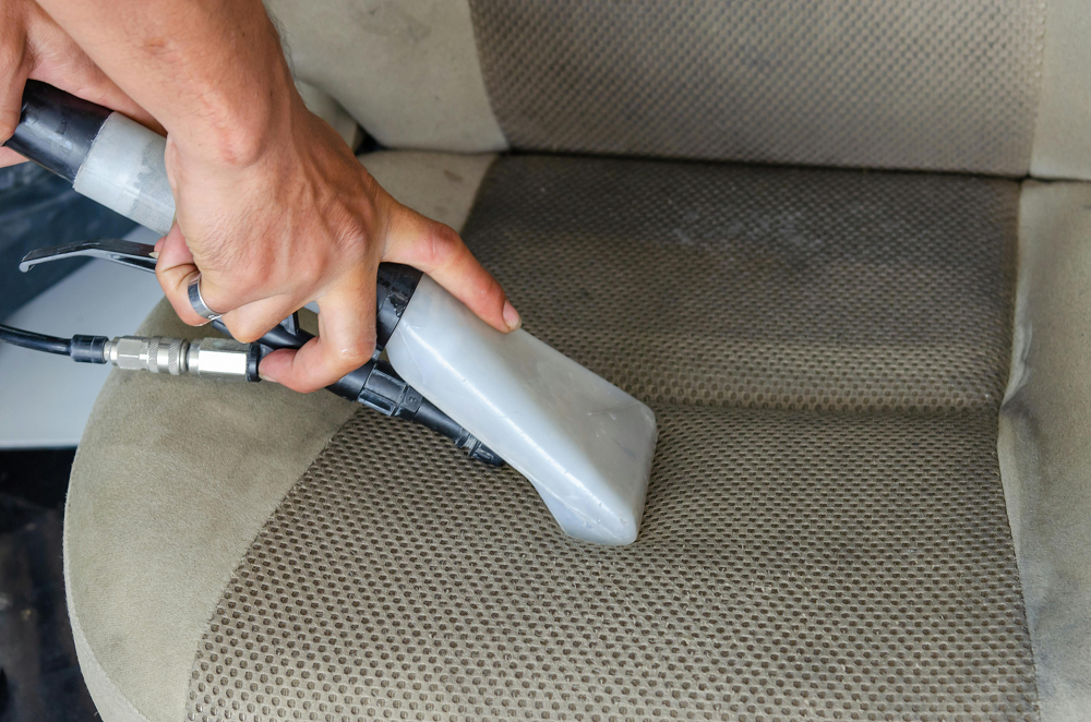 cleaning sofa with vacuum